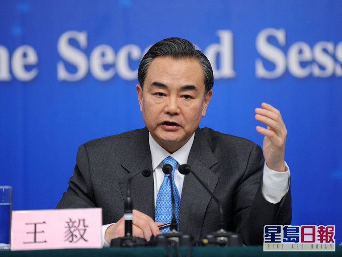 王毅說，中日韓三國面對疫情「守望相助、同舟共濟」。