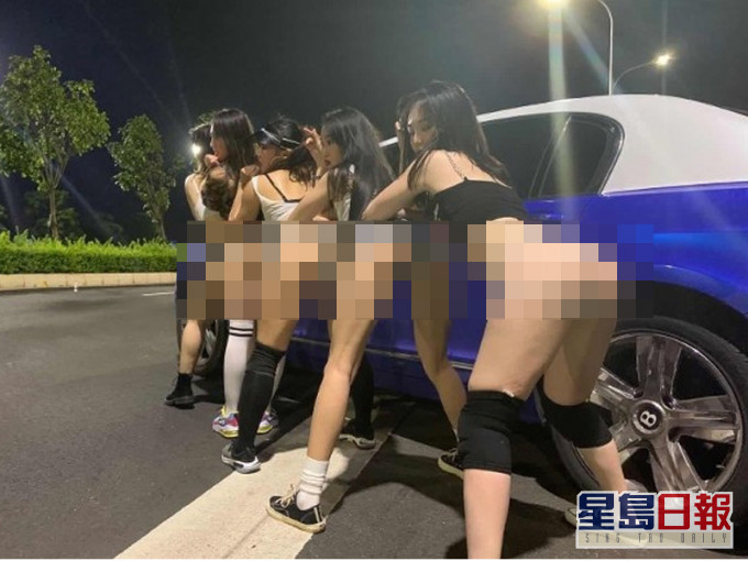 為舞蹈室宣傳，廣西多名女子深夜馬路大跳性感熱舞，違反交通規則被罰。(網圖)