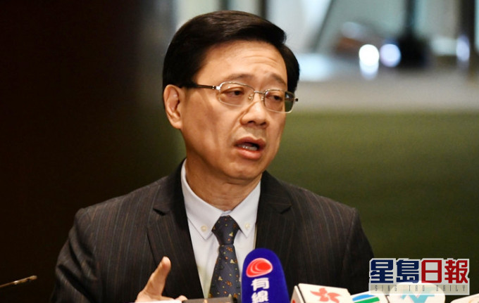 李家超指特区政府会按法律条文理行职责。 资料图片