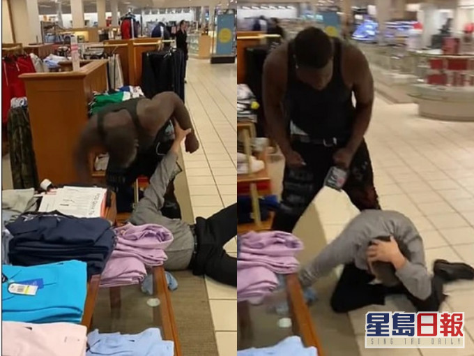 黑人男子将店员暴打在地。网图