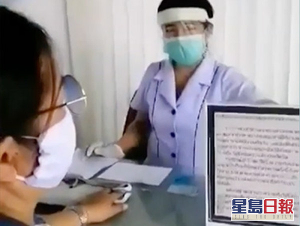 醫生會要求患者依據牌上的誓言,向諸佛發誓,絕不隱瞞任何病史或旅行史。(網圖)