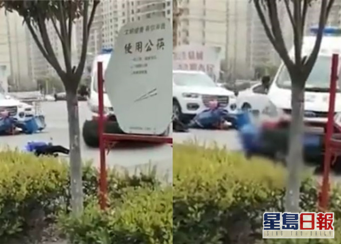 外賣員在被私家車遭撞倒後,再被救護車輾過受傷。影片截圖