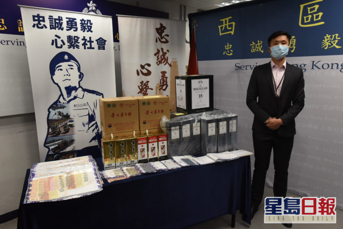 警方破盜用信用卡買名酒轉售集團。
