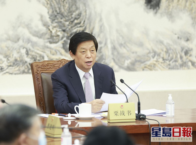 栗戰書主持全國人大常委會第27次會議閉幕會。新華社圖片