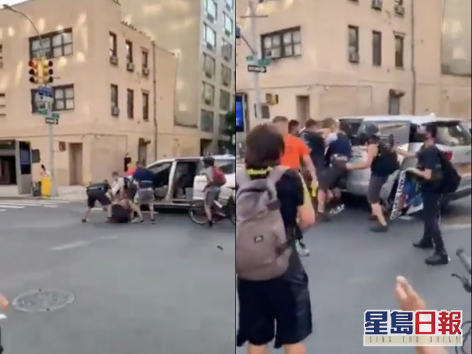 一批便衣人員在曼克頓市中心街上拘捕一名女子,強行把她推上車。網圖