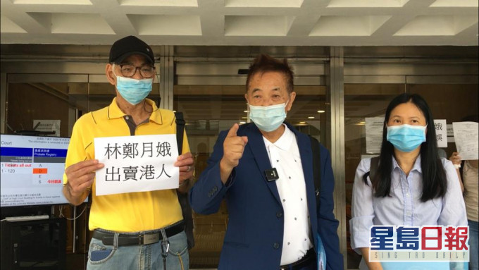 郭卓堅(中) 陳潔冰 (右)。 劉曉曦攝