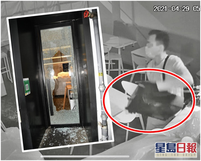 賊人闖入咖啡店後抬走收銀機(紅圈示)。片段截圖