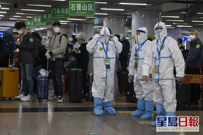 新冠肺炎在內地有緩和跡象,惟各地均仍不鬆懈。AP