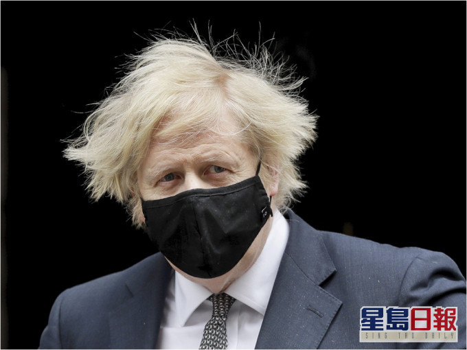 約翰遜表明支持被中方制裁的9名英國公民。AP資料圖片
