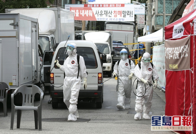 南韓增逾二百人確診,主要與教會有關。AP圖