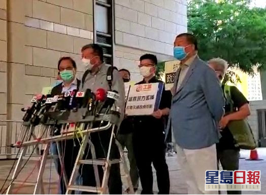 3人在法院外見記者。蕭文軒攝
