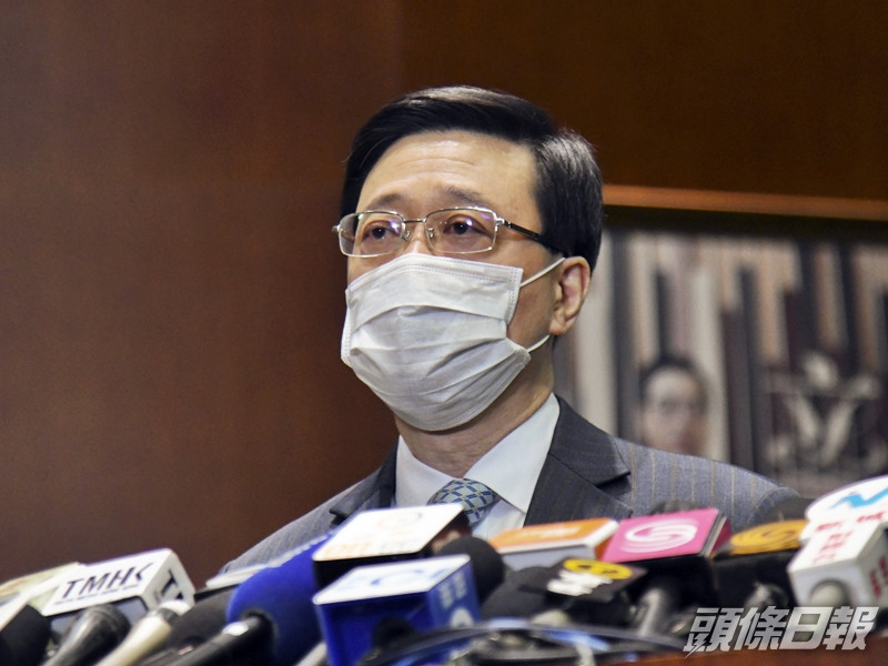 保安局局長李家超聯同6位紀律部隊首長,表示歡迎及全力支持全國人大通過《基本法》附件一及附件二的修訂。資料圖片