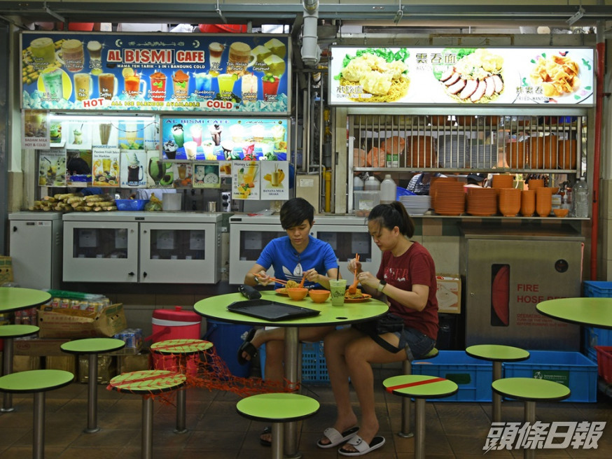 新加坡將放寬防疫措施,容許食肆開放堂食。新華社資料圖片