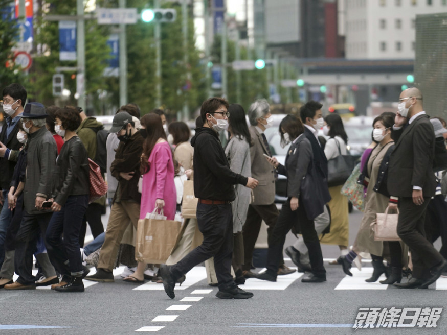 日本新冠確診個案超10萬。AP圖片