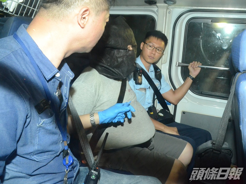 被告被警方拘捕調查。資料圖片
