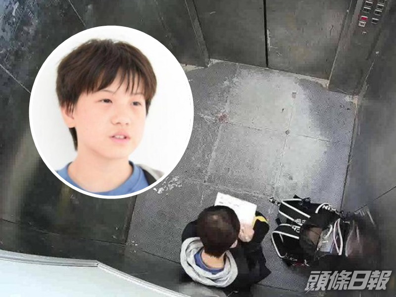 男孩淡定做功課。網圖