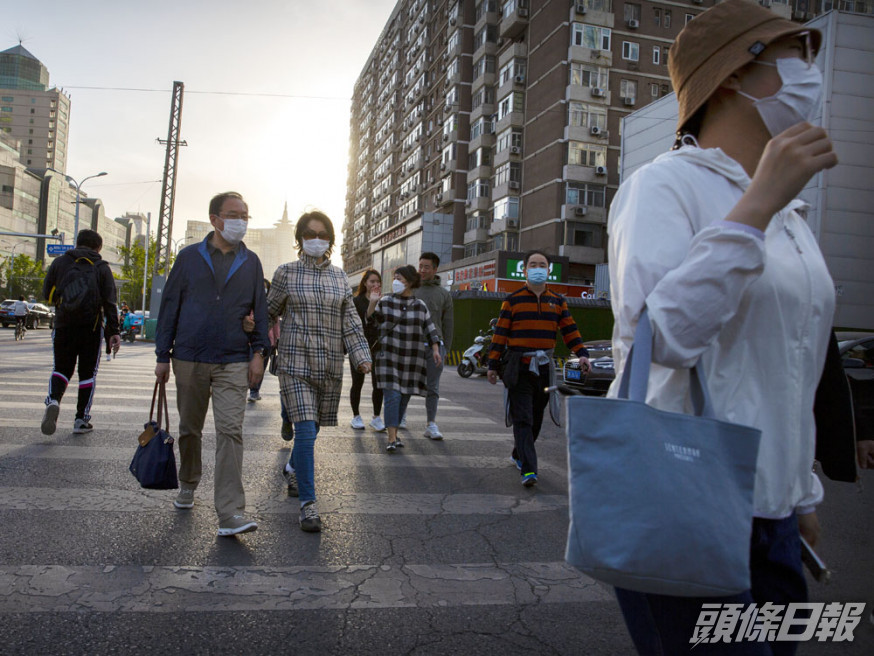 人口普查結果公布,內地全國人口共14億1千多萬人。AP資料圖片