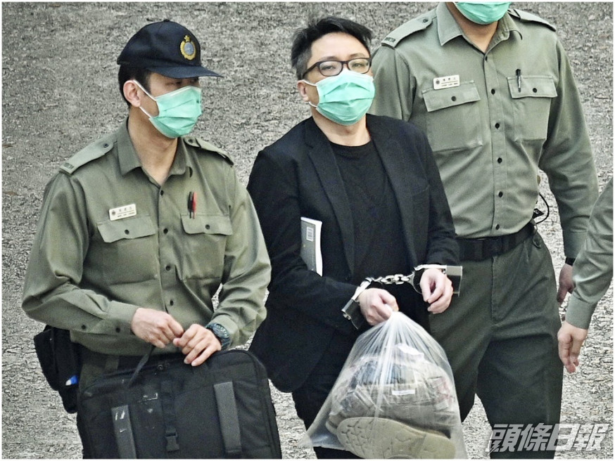 譚得志(中)3宗案件合併共被控14項控罪。資料圖片