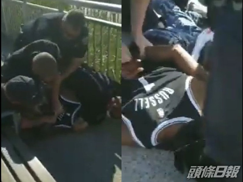 有途人拍攝到4名警員聯手制服一名黑人男子。影片截圖