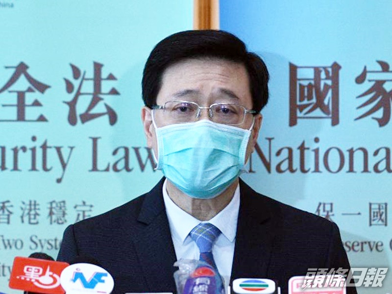李家超指香港無限制陳同佳自首。