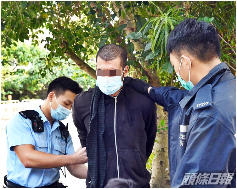 涉案南亞漢(中)身高約6呎。