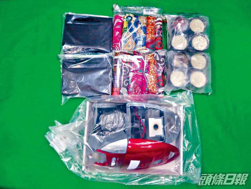 收藏毒品的物品包括吸塵機及蠟燭。