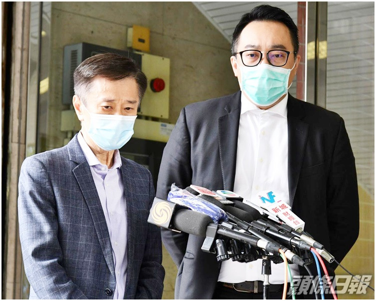 姚思榮冀盡快與內地通關。右為黃進達。