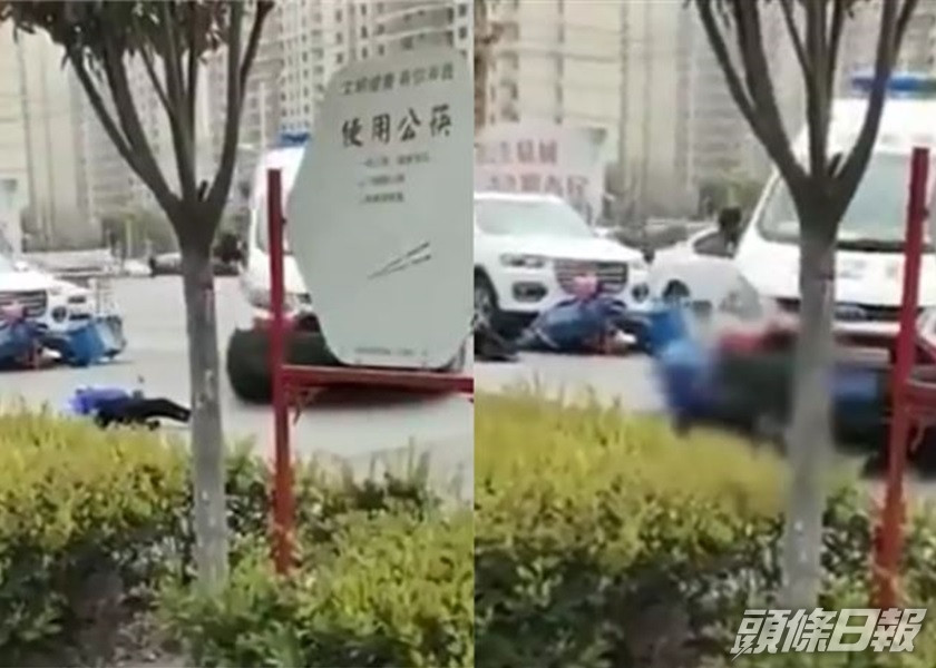 外賣員在被私家車遭撞倒後,再被救護車輾過受傷。影片截圖