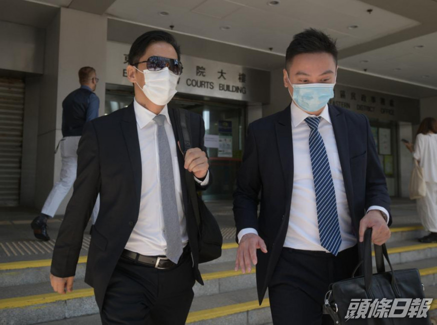 被告龍少泉(左)。
