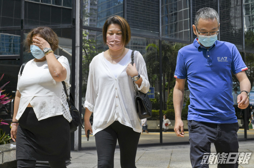 被告潘秀芳(左)、被告王宣麗(中)和被告李為民(右)。 資料圖片