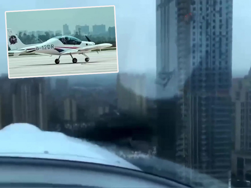 影片從小型飛機內拍攝,最低飛行高度明顯低於住宅頂層高度。網圖