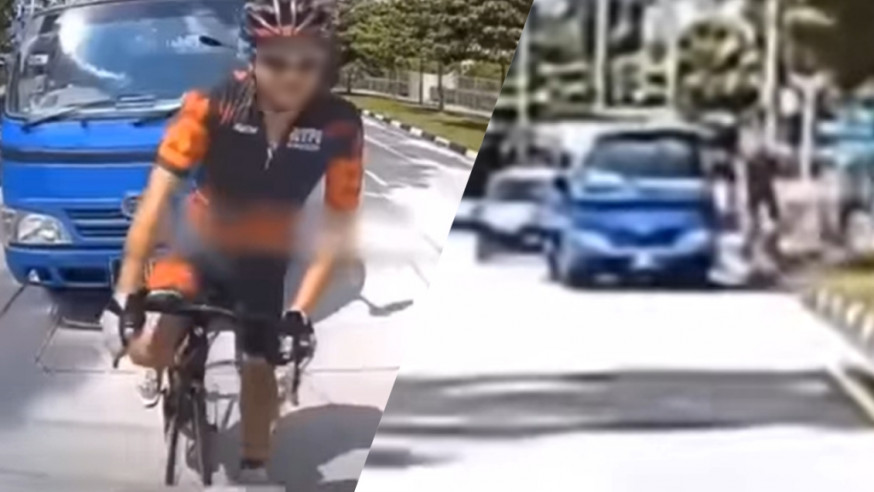 單車手故意擋路，遭司機報復撞飛。影片截圖