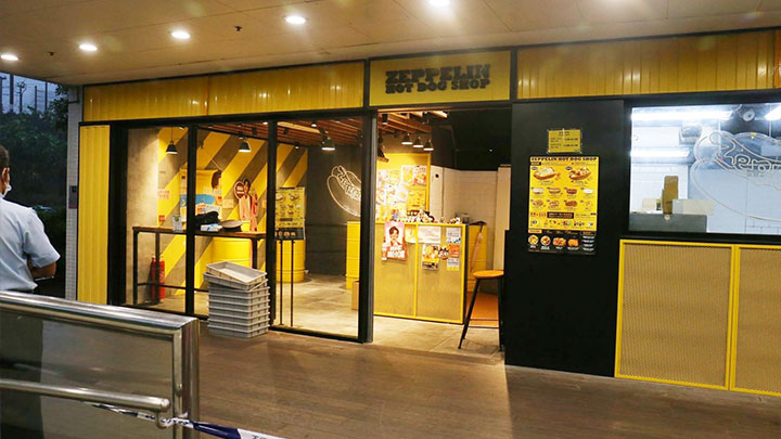 屯門一間熱狗店的女職員於店內燒炭亡。